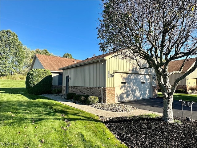 view of property exterior featuring a lawn