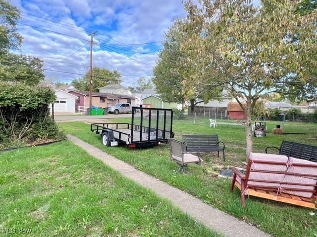 surrounding community featuring a yard