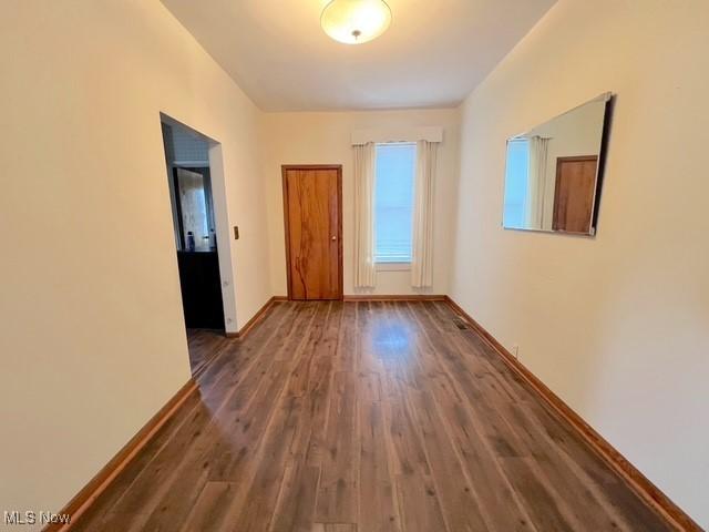 interior space featuring dark wood-type flooring