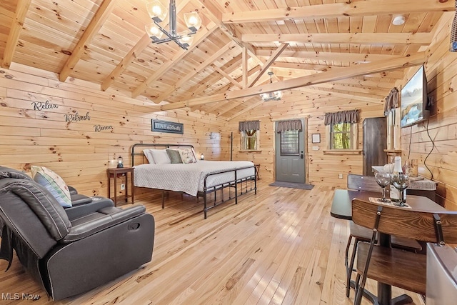 bedroom featuring vaulted ceiling with beams, light wood-type flooring, wood walls, and wood ceiling