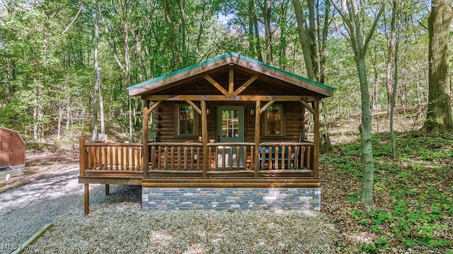 view of front of property with a deck