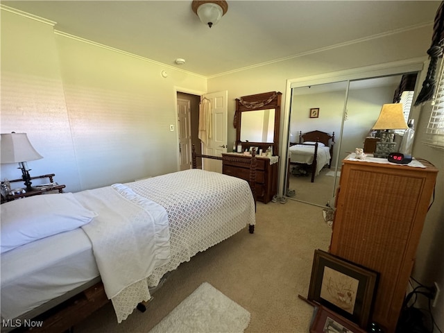 bedroom featuring light carpet, ornamental molding, and a closet