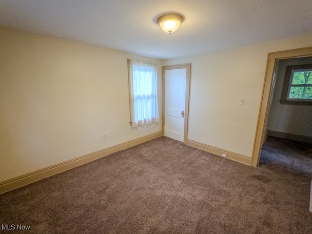 spare room with carpet floors