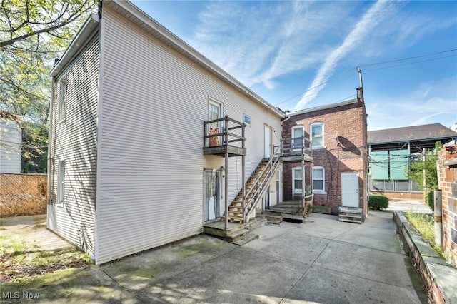 rear view of property with a patio area