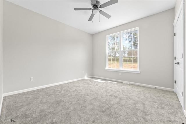 carpeted empty room with ceiling fan