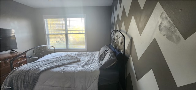 bedroom with multiple windows