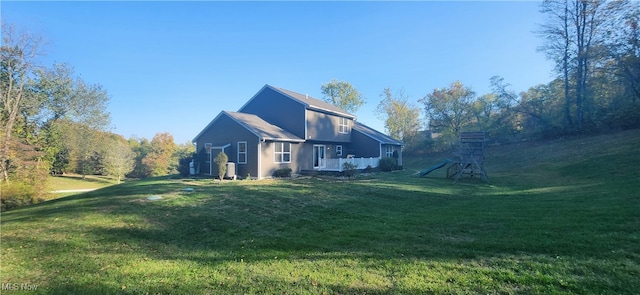 view of property exterior with a yard