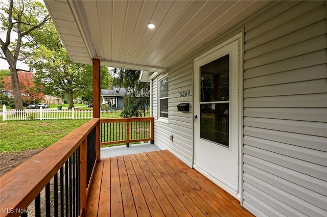 deck featuring a yard