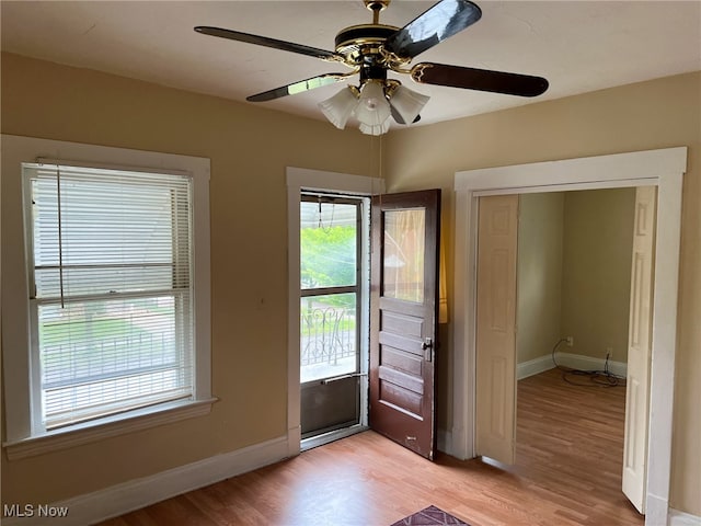 entryway featuring light hardwood / wood-style flooring and ceiling fan