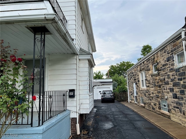 view of property exterior featuring a garage