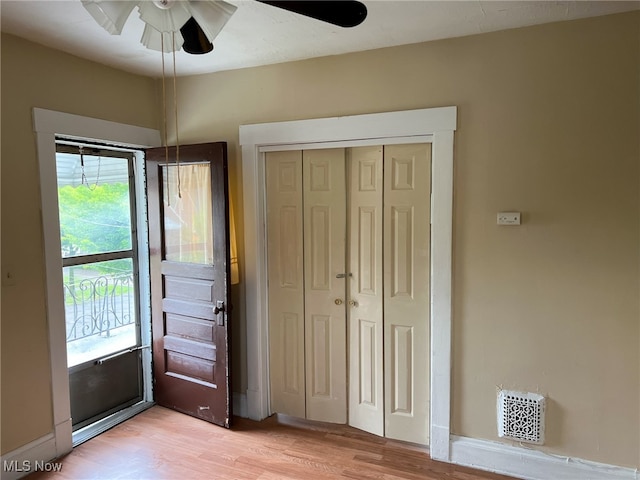 interior space featuring ceiling fan and light hardwood / wood-style flooring