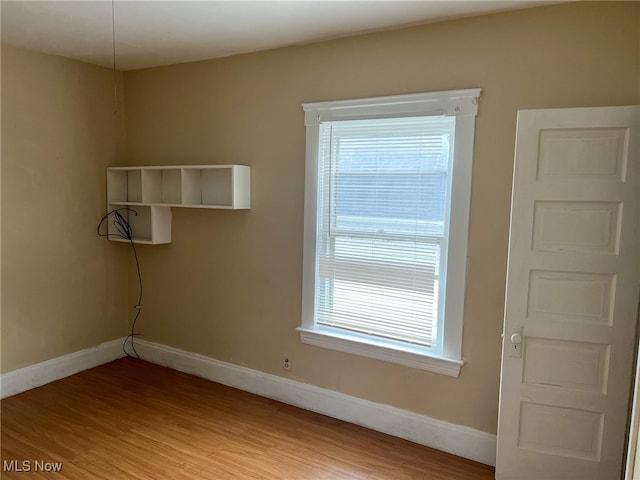 empty room featuring hardwood / wood-style floors