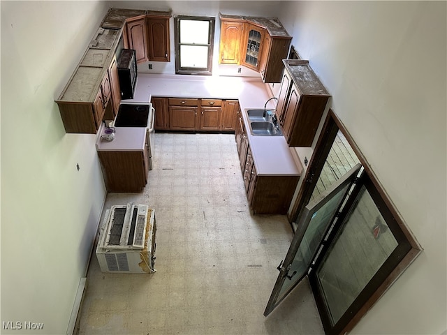 kitchen featuring stove and sink