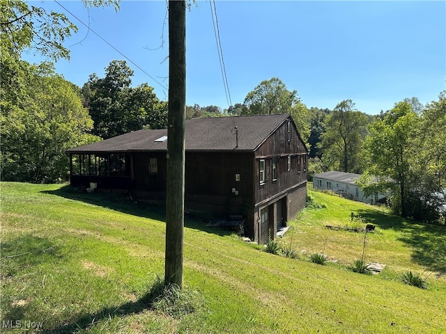 back of house with a yard