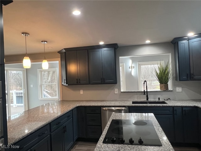 kitchen featuring light stone countertops, sink, stainless steel dishwasher, and black electric cooktop