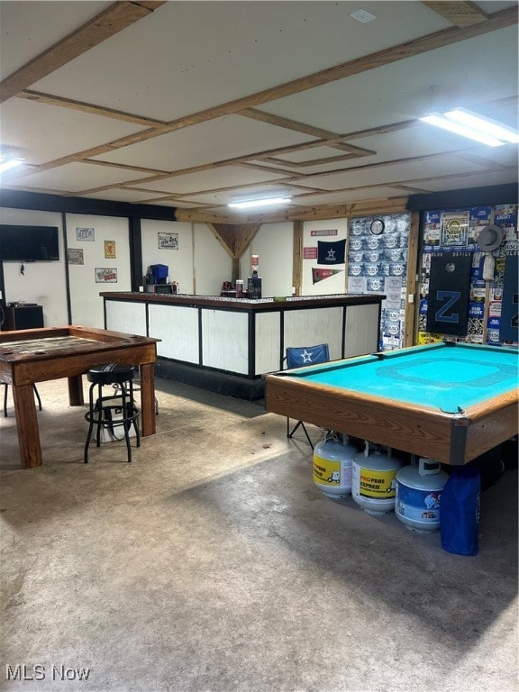 playroom with pool table and concrete flooring