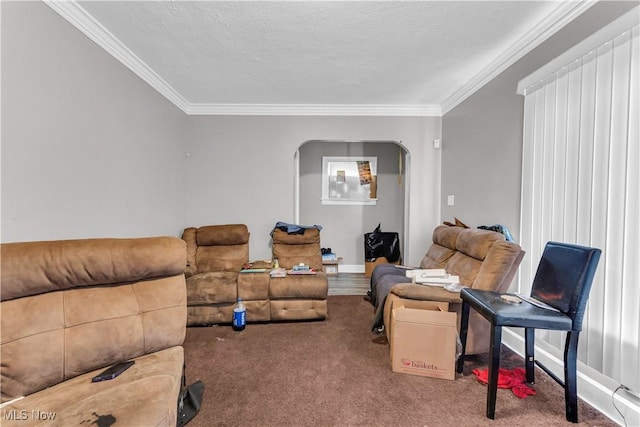 living room with arched walkways, ornamental molding, carpet, and a textured ceiling