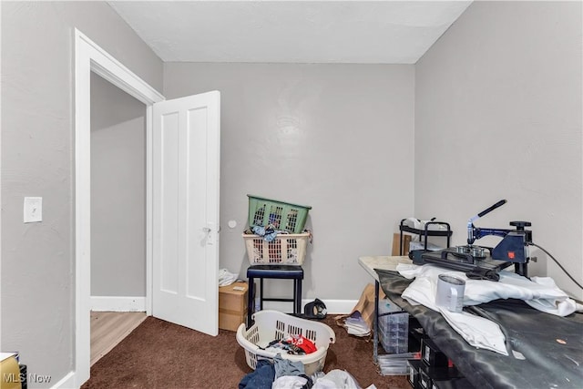 office featuring baseboards and carpet