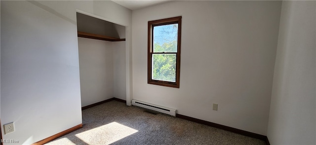 unfurnished bedroom with dark carpet, a closet, and a baseboard radiator