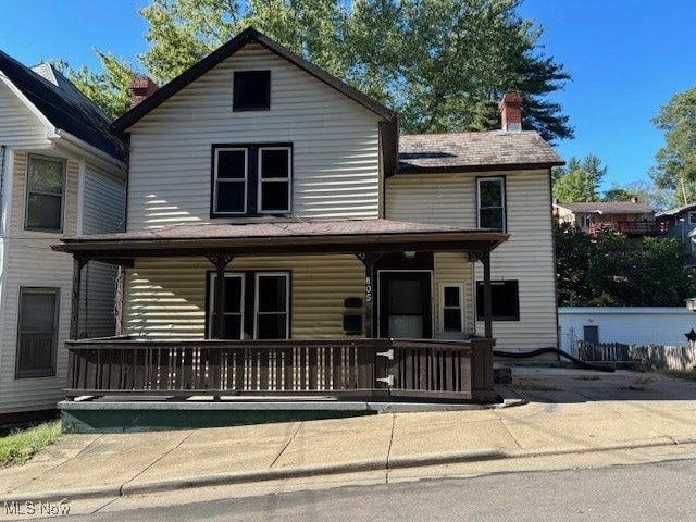 view of front of home featuring covered porch