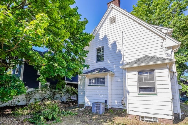 back of property with central air condition unit