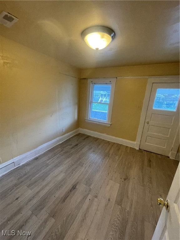 entrance foyer featuring light hardwood / wood-style floors