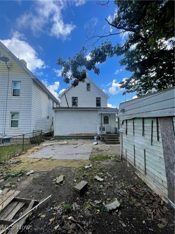 back of property featuring a patio