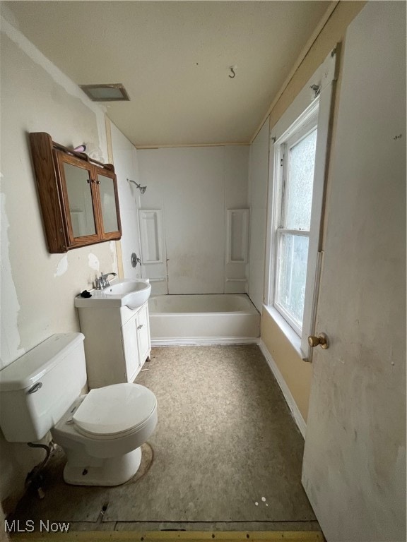 full bathroom featuring vanity, toilet, shower / washtub combination, and a wealth of natural light