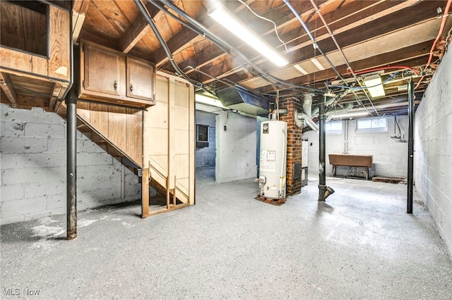 basement with water heater and sink