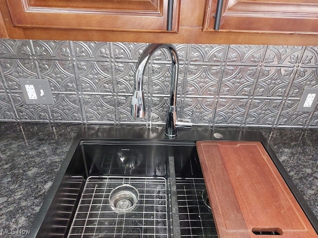 details with dark stone counters and sink