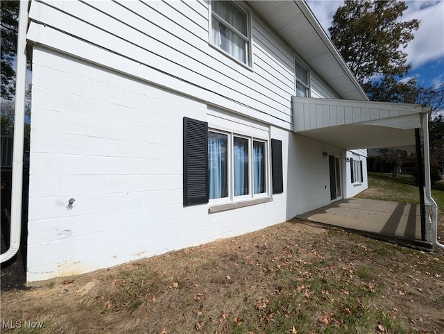 view of home's exterior featuring a patio