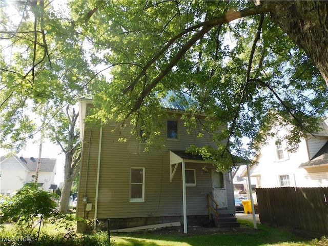 386 Jackson St, Conneaut, OH 44030 - rear view of property featuring fence