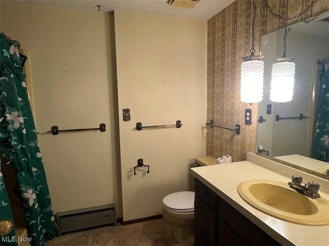 bathroom with vanity, baseboard heating, toilet, and curtained shower