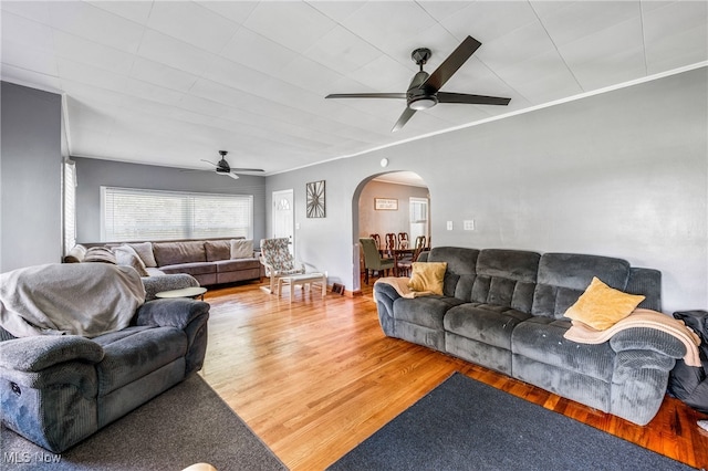 living room with ceiling fan and hardwood / wood-style floors