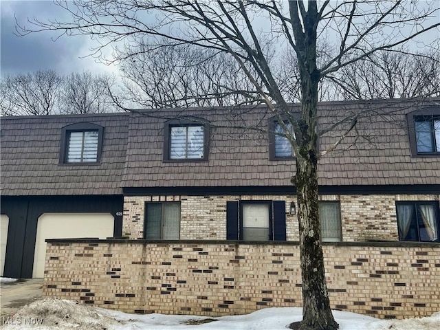 view of snow covered property