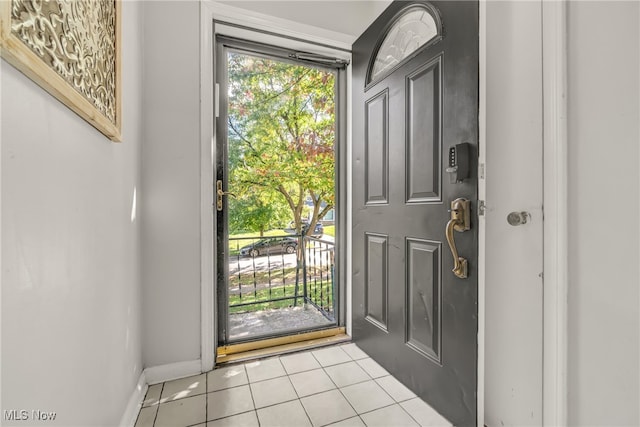 doorway featuring light tile patterned flooring