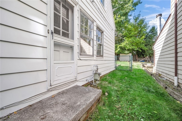 view of home's exterior featuring a yard