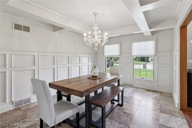 dining area featuring crown molding, beamed ceiling, a chandelier, and coffered ceiling