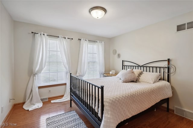 bedroom featuring hardwood / wood-style floors