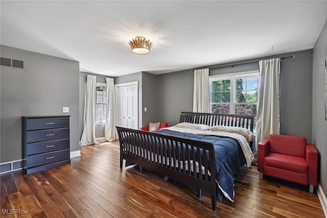 bedroom featuring dark hardwood / wood-style floors