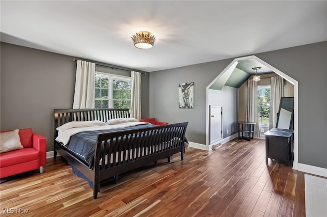 bedroom with hardwood / wood-style flooring