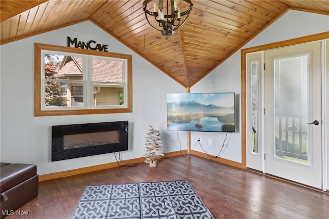 sitting room with dark hardwood / wood-style floors, wood ceiling, lofted ceiling, and a notable chandelier