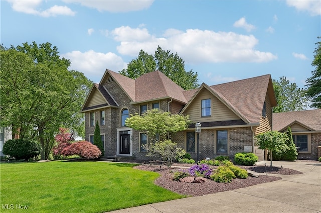 view of front of property with a front lawn