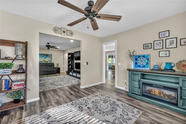 interior space featuring ceiling fan and hardwood / wood-style flooring