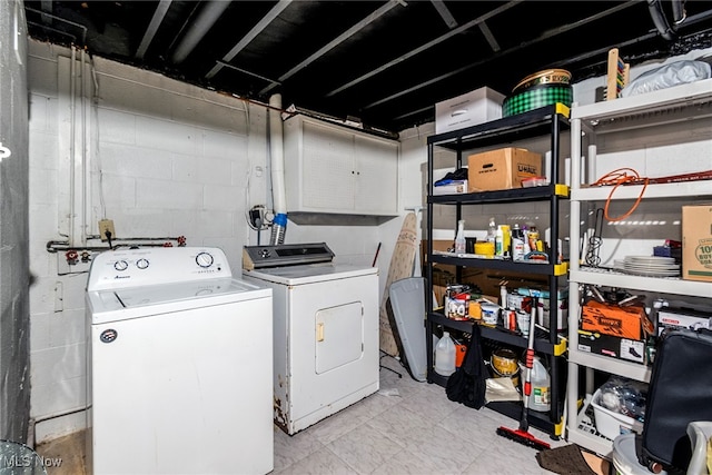 laundry area featuring washing machine and clothes dryer