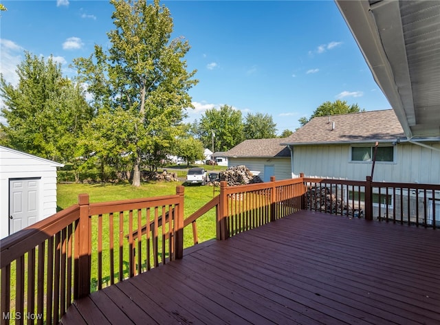 deck featuring a lawn