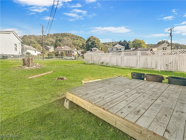 view of yard with a wooden deck