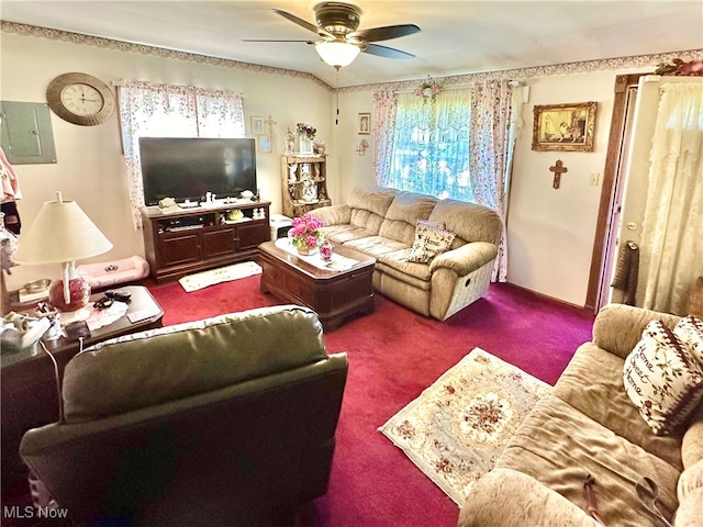 living room with carpet floors, electric panel, and ceiling fan