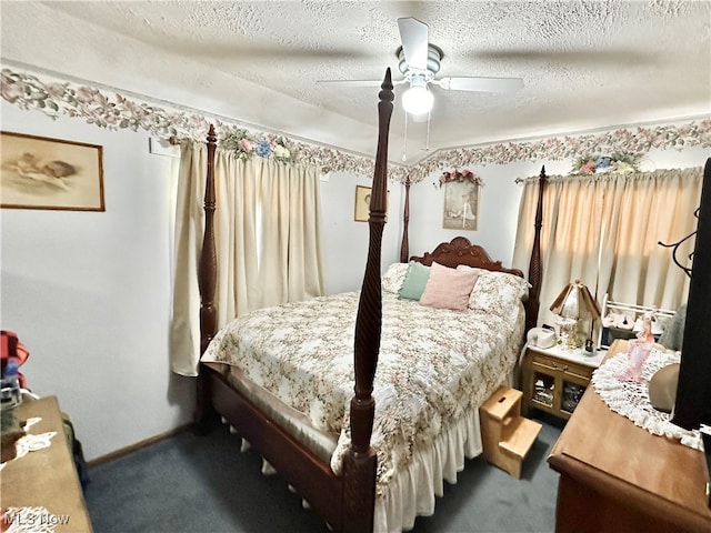 bedroom with ceiling fan, a textured ceiling, and carpet flooring