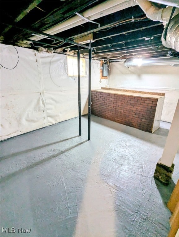 basement with electric panel